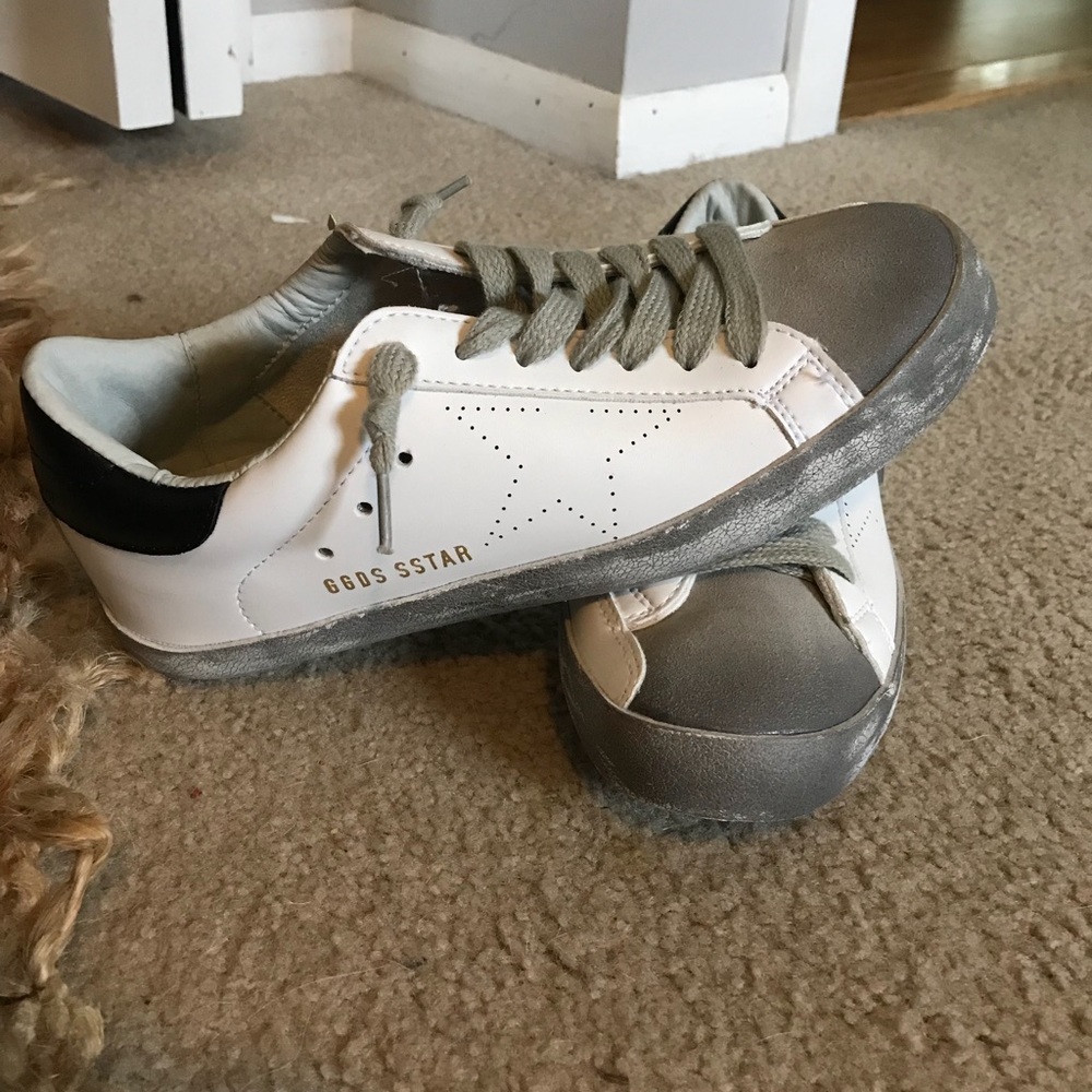 Black and white sneakers, similar to Golden Goose